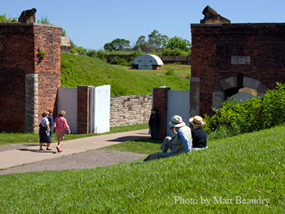 Tourists spend a sunny day at Historic Fort Wayne, one of Michigan's historic sites with Civil War history.
